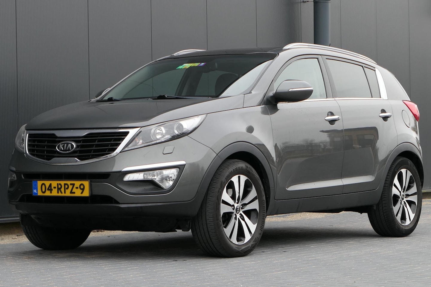 Kia Sportage - 2.0 X-clusive NAP Panodak Clima Leder Navi Carplay Stoelverwarming - AutoWereld.nl