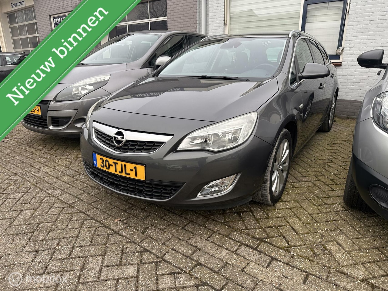 Opel Astra Sports Tourer - 1.4 Turbo Sport 1.4 Turbo Sport - AutoWereld.nl