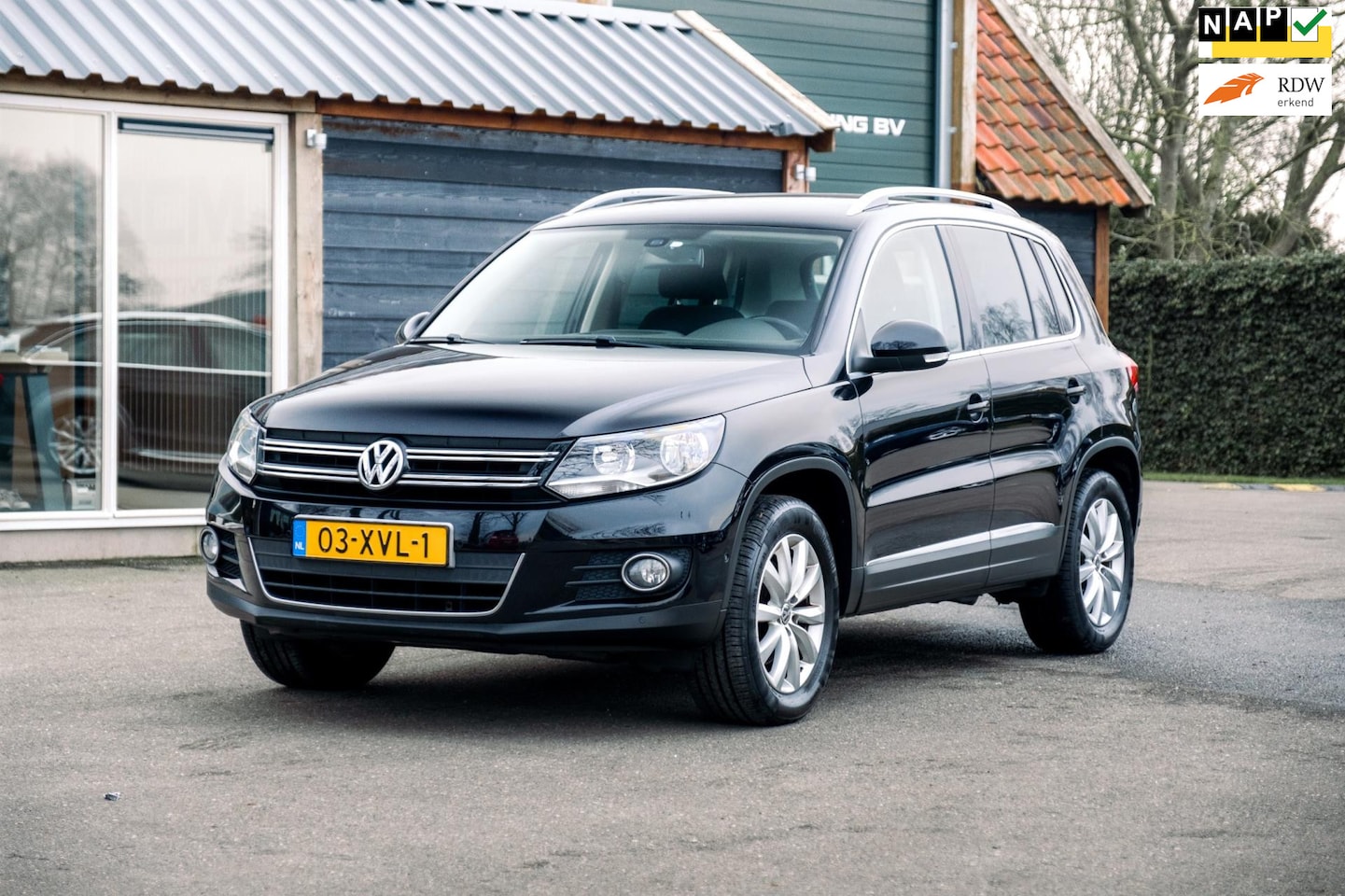 Volkswagen Tiguan - 1.4 TSI Sport&Style (NL-Auto / Dealeronderhouden / 1e Eigenaar / Climate / Cruise) - AutoWereld.nl