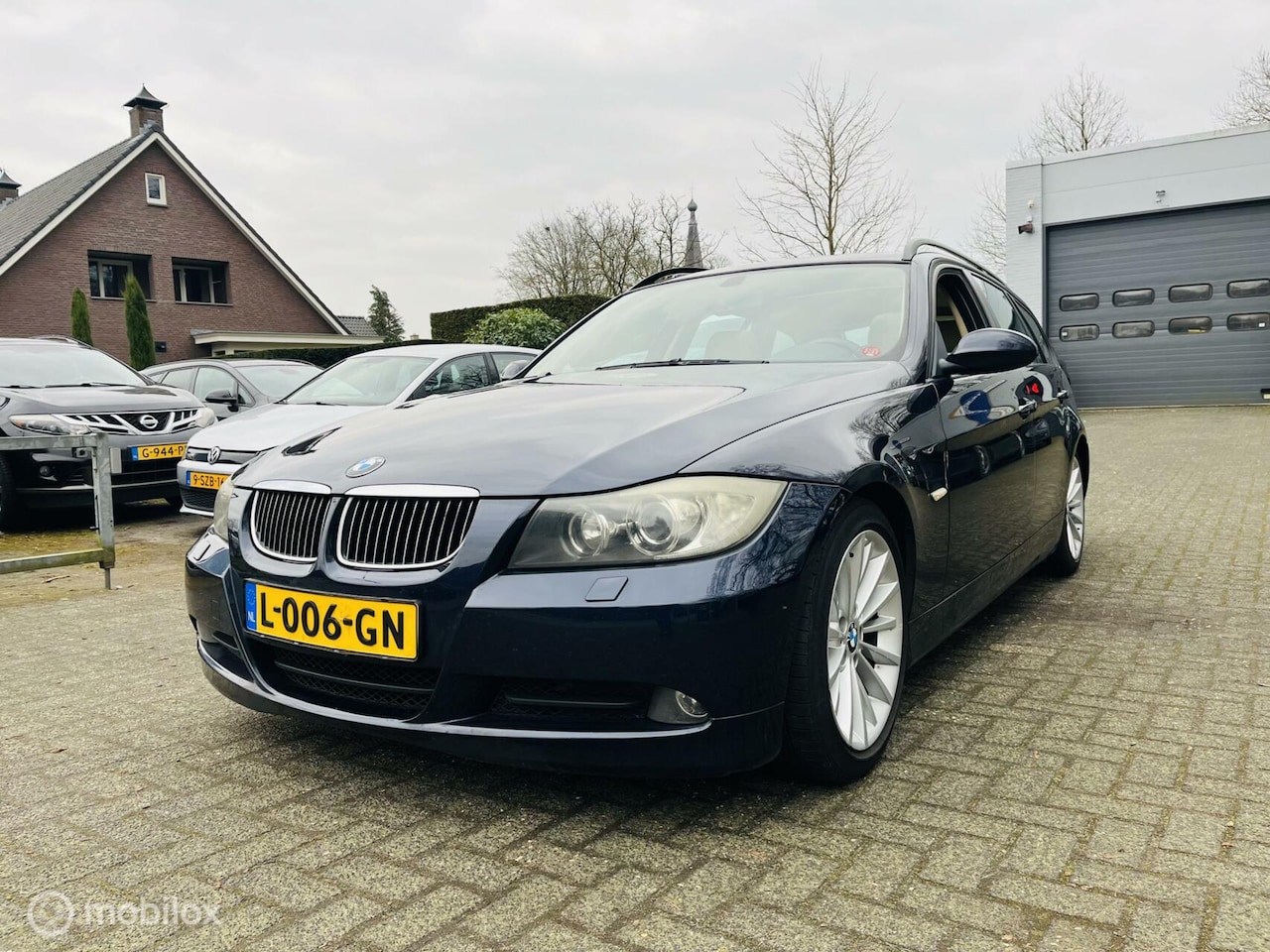 BMW 3-serie Touring - 320d High Executive Automaat / Pano-dak / Leder / LM / Clima - AutoWereld.nl