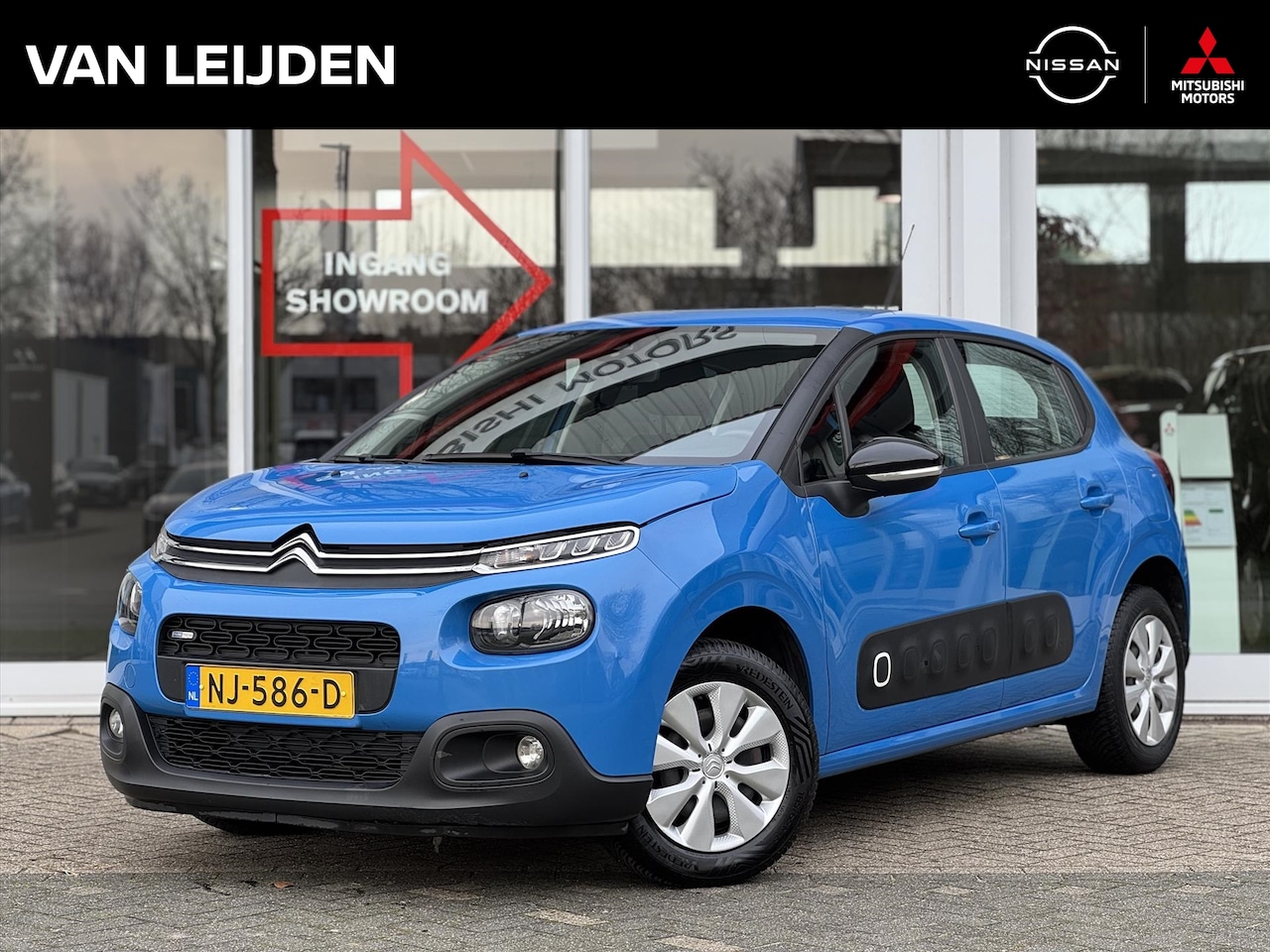 Citroën C3 - 1.2 PureTech 82pk Feel | Navigatie | CarPlay | Clima | Cruise Control | PDC | All Season B - AutoWereld.nl