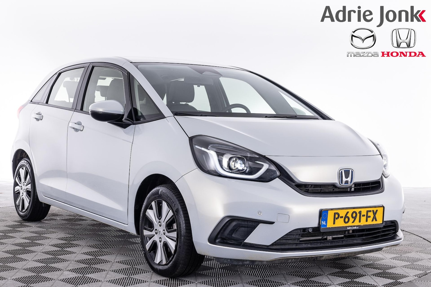 Honda Jazz - 1.5 e:HEV Elegance | AUTOMAAT | APPLE CARPLAY | CLIMATE CONTROL | PARKEERSENSOREN | ADAPTI - AutoWereld.nl