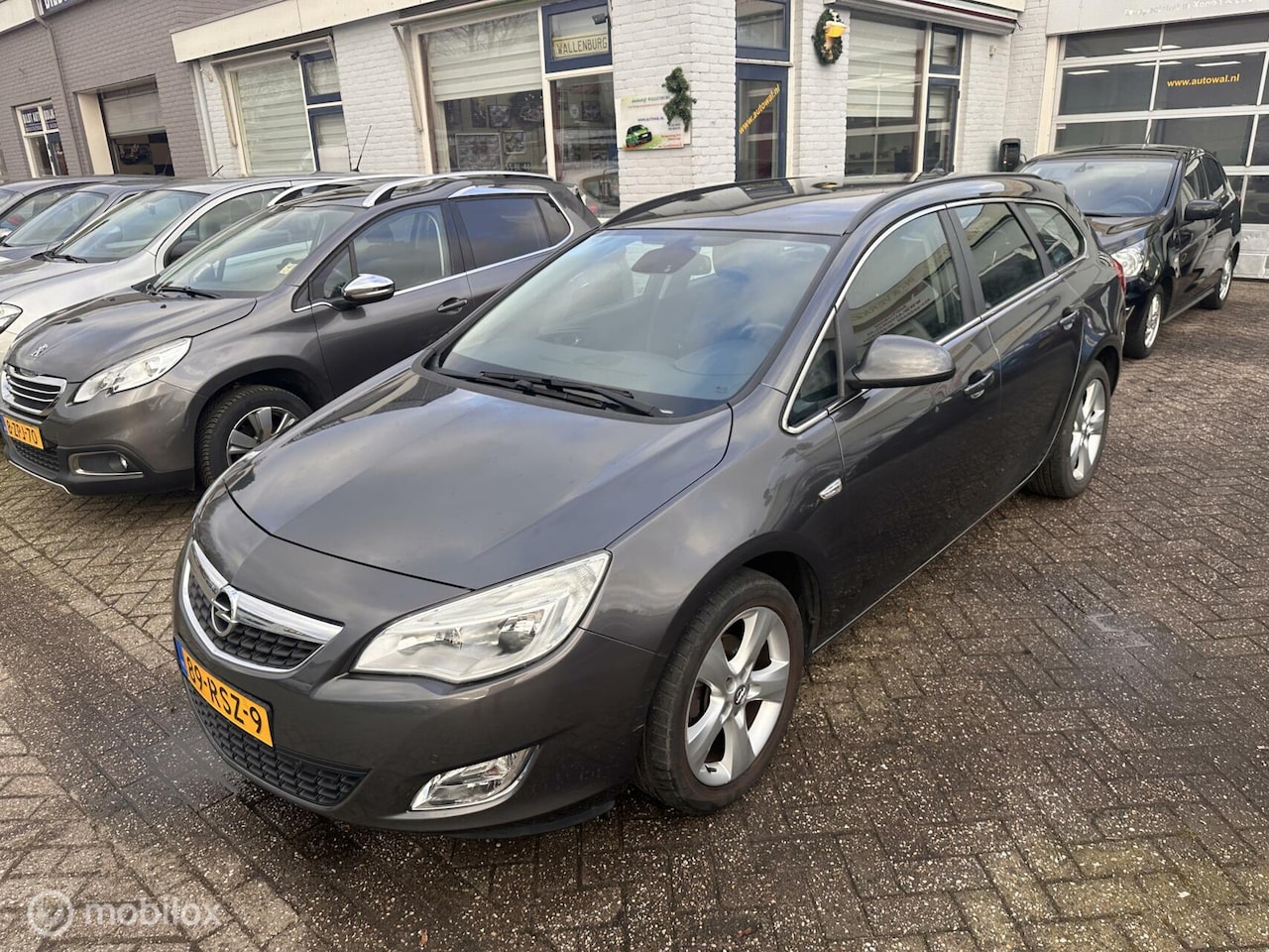 Opel Astra Sports Tourer - 1.4 Edition 1.4 Edition - AutoWereld.nl