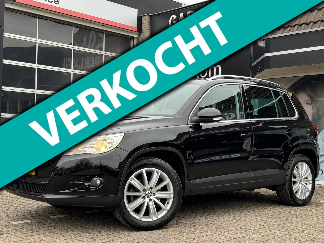 Volkswagen Tiguan - 2.0 TSI Sport&Style 4Motion | Navi | Camera | Trekhaak | Pdc | Isofix - AutoWereld.nl