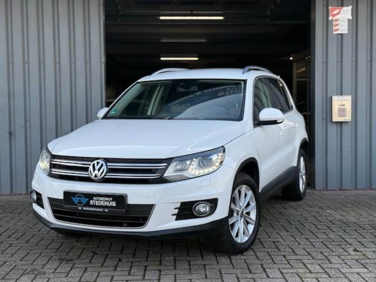 Volkswagen Tiguan - 2.0 TSI Sport&Style 4Motion - AutoWereld.nl