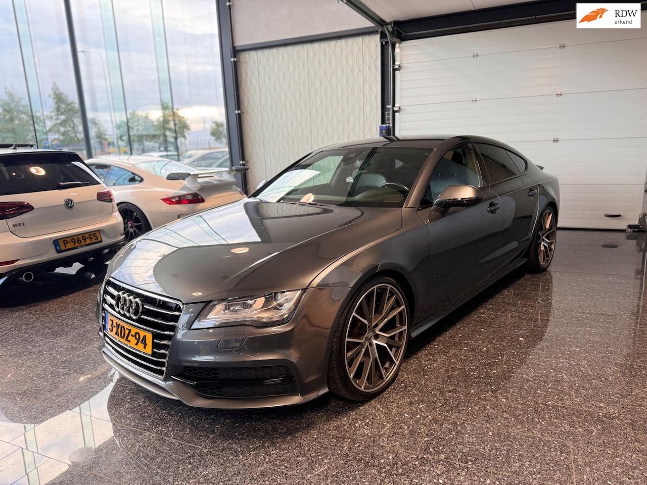 Audi A7 Sportback - 3.0 TFSI Quattro S-line 420PK Luchtvering 21'' - AutoWereld.nl