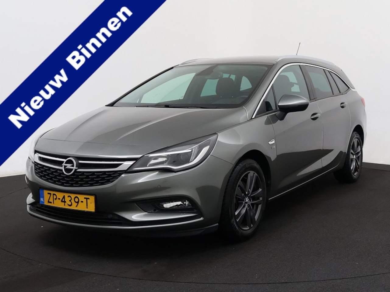 Opel Astra Sports Tourer - 1.4 Turbo 120 Jaar Edition 150pk Aut. 120 Jaar Edition | Navi | Trekhaak | LMV |  07-2019 - AutoWereld.nl