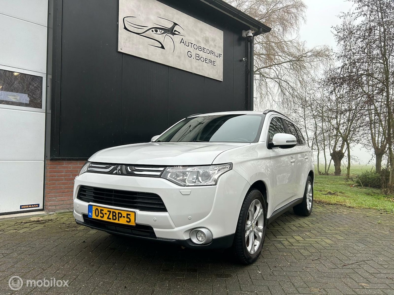 Mitsubishi Outlander - 2.0 Intense 2.0 Intense+, 7 pers, nette auto - AutoWereld.nl