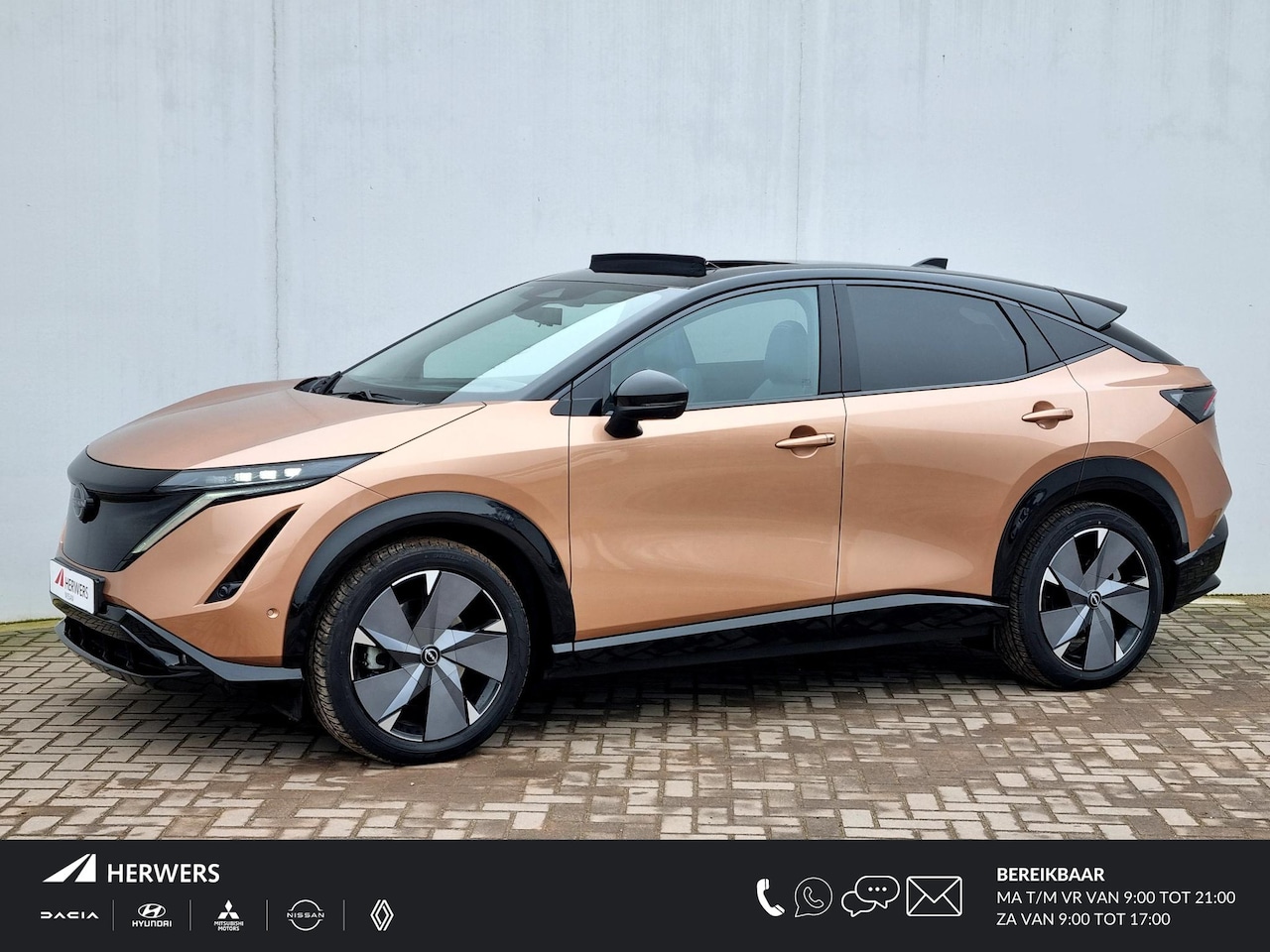 Nissan Ariya - e-4ORCE Evolve+ 87 kWh 4WD Automaat / Schuif-/Kanteldak / 3 Fase / CCS Snelladen / Lederen - AutoWereld.nl