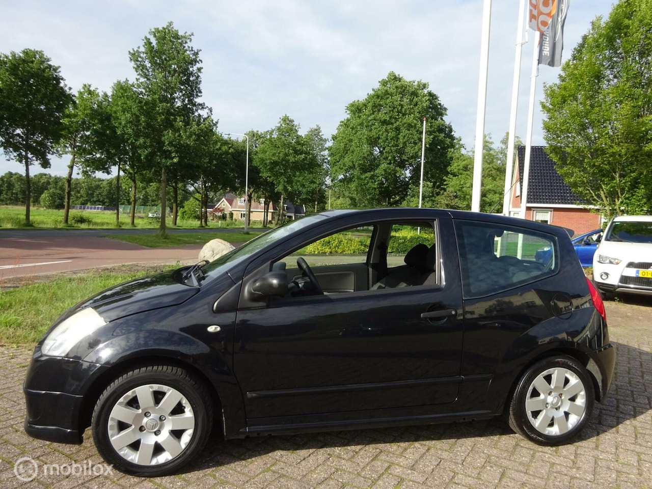 Citroën C2 - 1.4i Caractère '07 Sport|LM wielen|3-4-2025 APK! - AutoWereld.nl