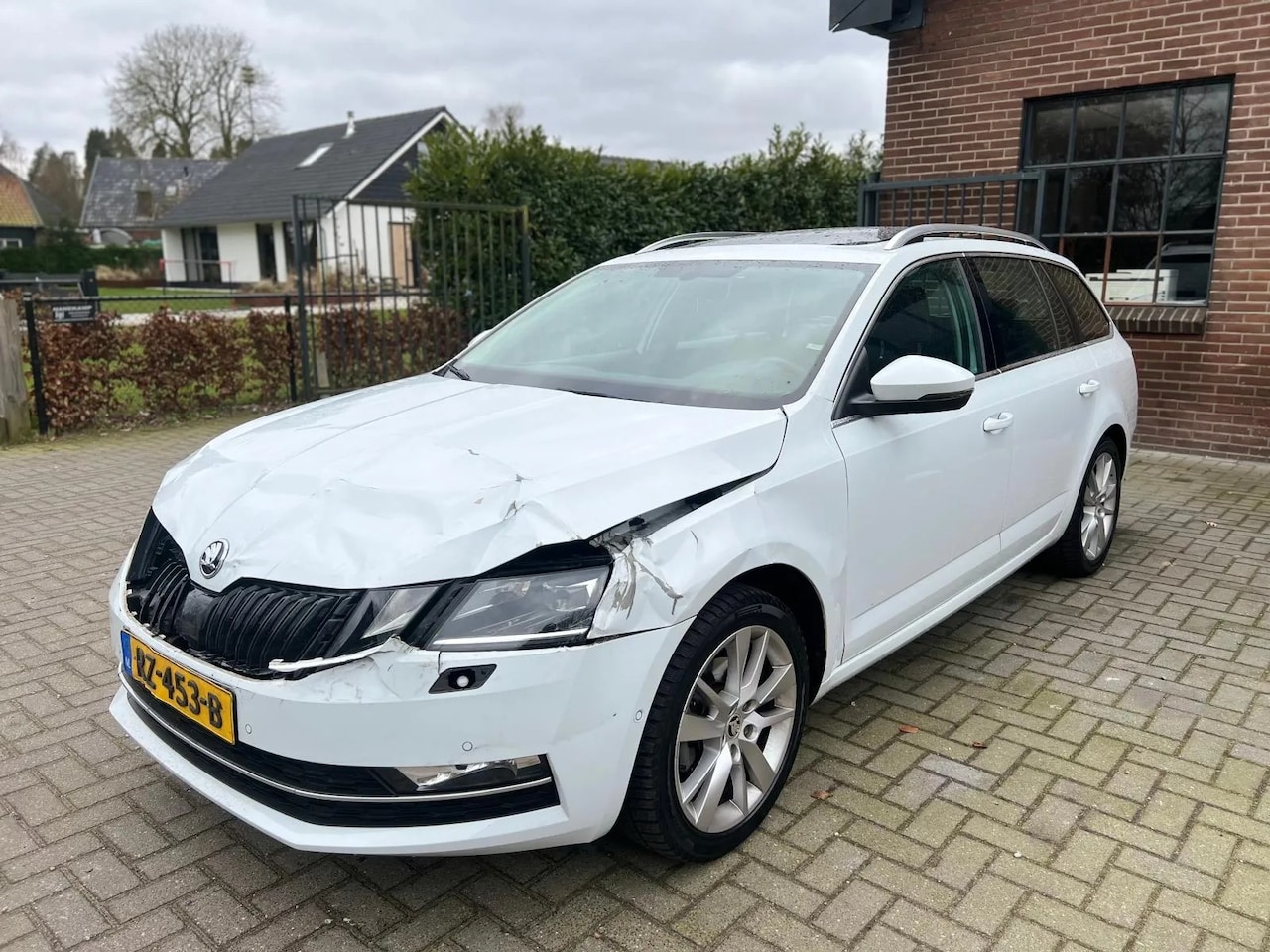 Skoda Octavia Combi - 1.0 TSI 115pk Greentech Style Business LICHTE SCHADE - AutoWereld.nl