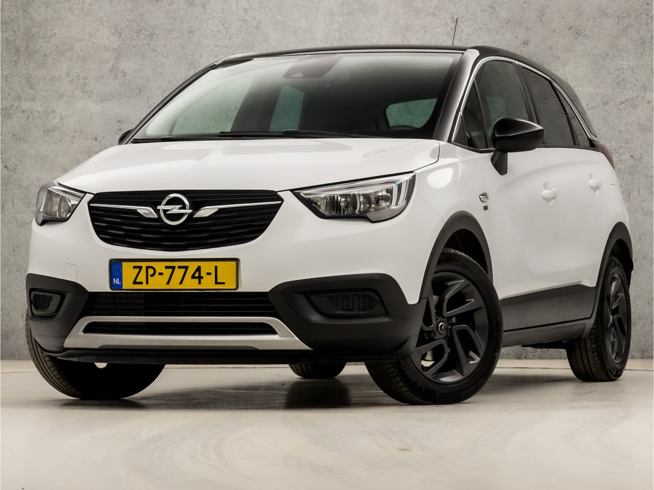 Opel Crossland X - 1.2 120 Jaar Edition (APPLE CARPLAY, NAP, GETINT GLAS, CRUISE, SPORTSTOELEN, LANE ASSIST, - AutoWereld.nl