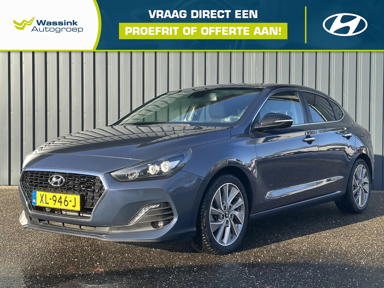 Hyundai i30 Fastback - 1.0 T-GDi 120pk Premium - Coupe met de ruimte van Stationwagon - Trekhaak | All seasons NL - AutoWereld.nl