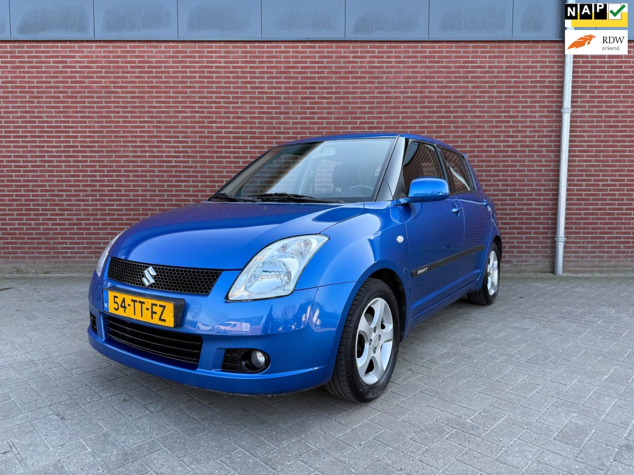 Suzuki Swift - 1.3 Shogun / NAP / Airco / Cruise control / Elerktrische ramen - AutoWereld.nl