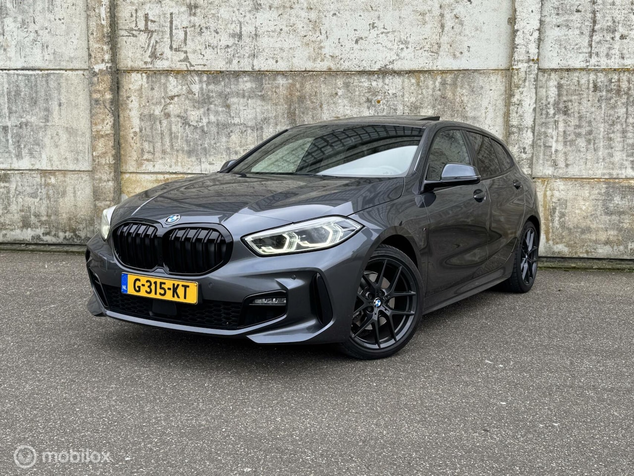 BMW 1-serie - 118i M Pakket/Pano/Headup/Cam/Cruise/Stoelverwarming/Vol! - AutoWereld.nl