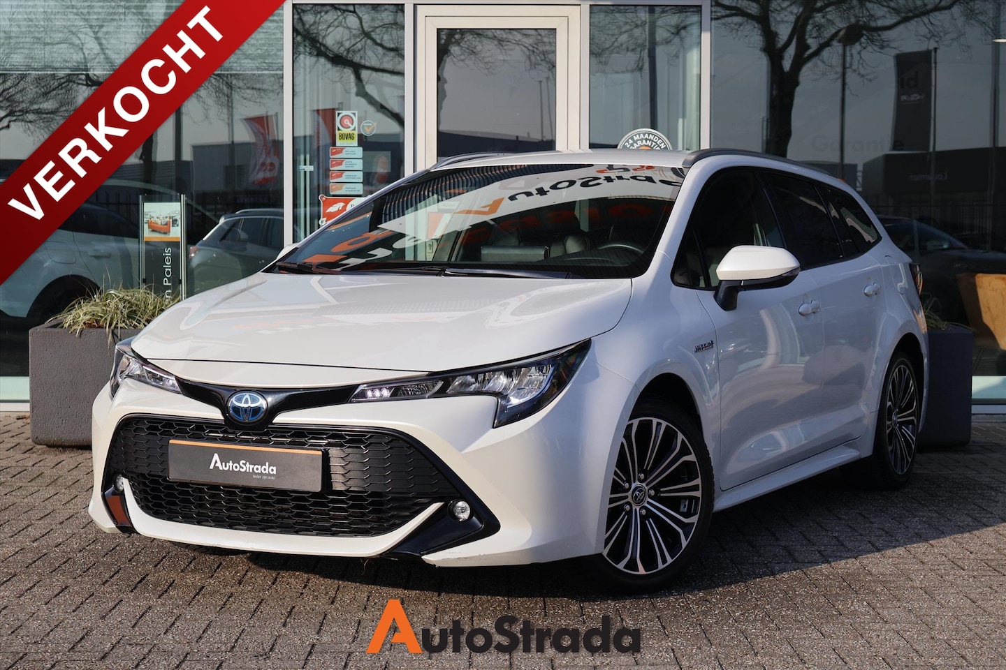 Toyota Corolla Touring Sports - 1.8 Hybrid 122pk CVT | Leder | Climate | Carplay | Camera | ACC | Navi - AutoWereld.nl