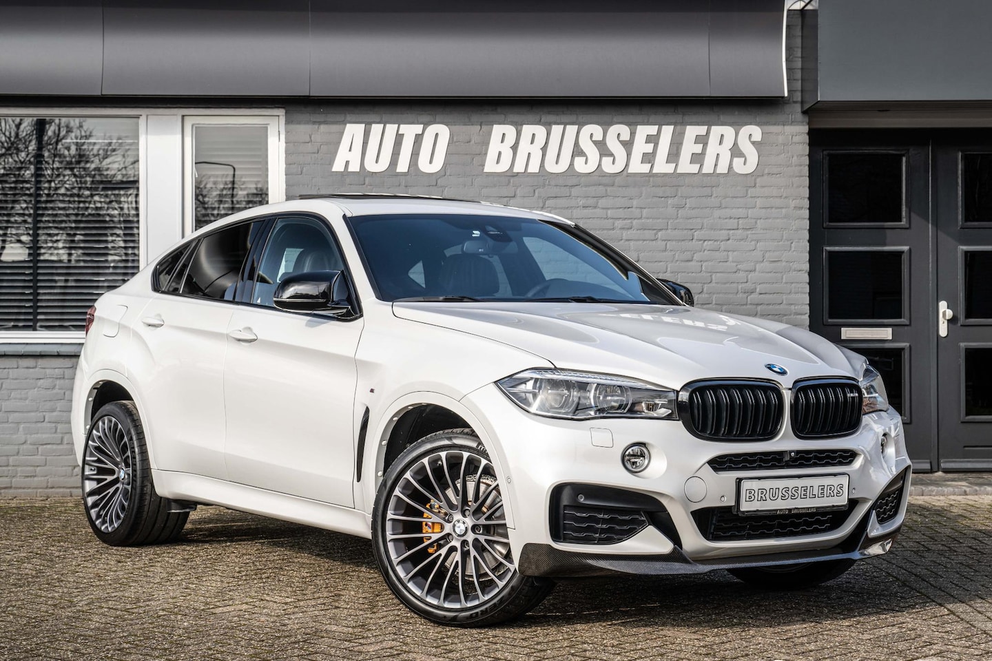 BMW X6 - xDrive35i High Executive M sport Pano 21"lm Carbon..... - AutoWereld.nl