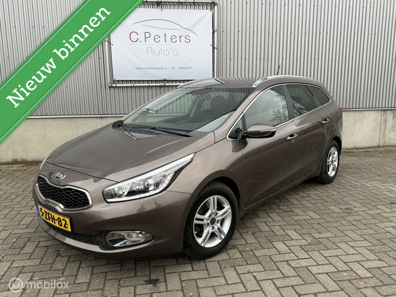 Kia Cee'd Sportswagon - 1.6 GDI DynamicLine 2015 / Navigatie / Camera / Cruisecontrol / NAP - AutoWereld.nl