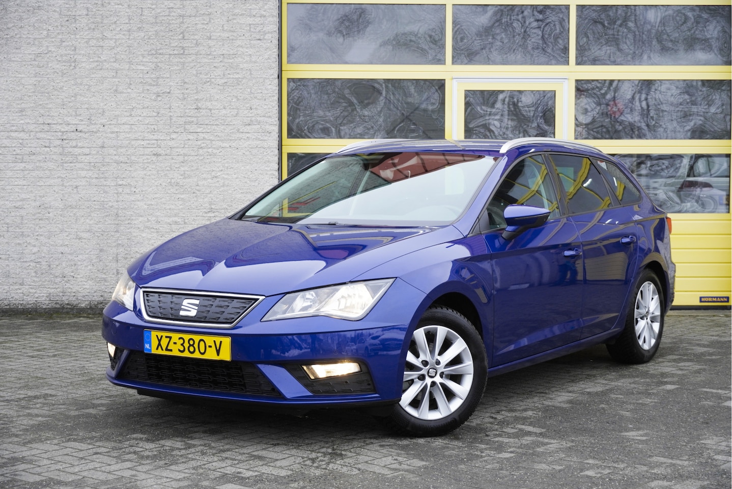 Seat Leon ST - 1.0 TSI Style Business Intense BJ2019 Lmv 16" | Led | Pdc | Navi | Keyless entry | Trekhaa - AutoWereld.nl