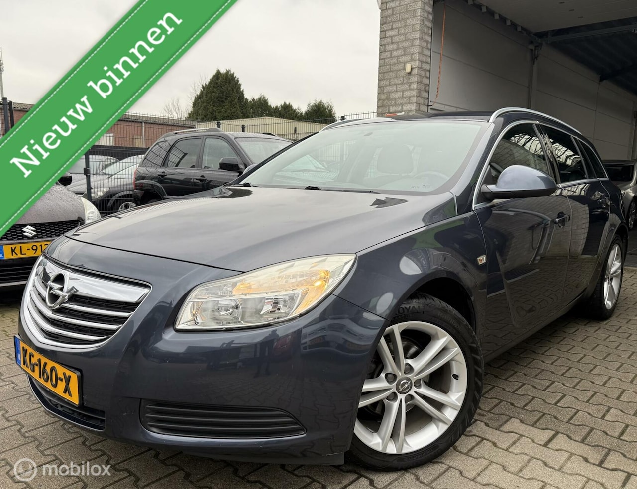 Opel Insignia Sports Tourer - 1.6 Edition / Navi / 140.000KM! - AutoWereld.nl