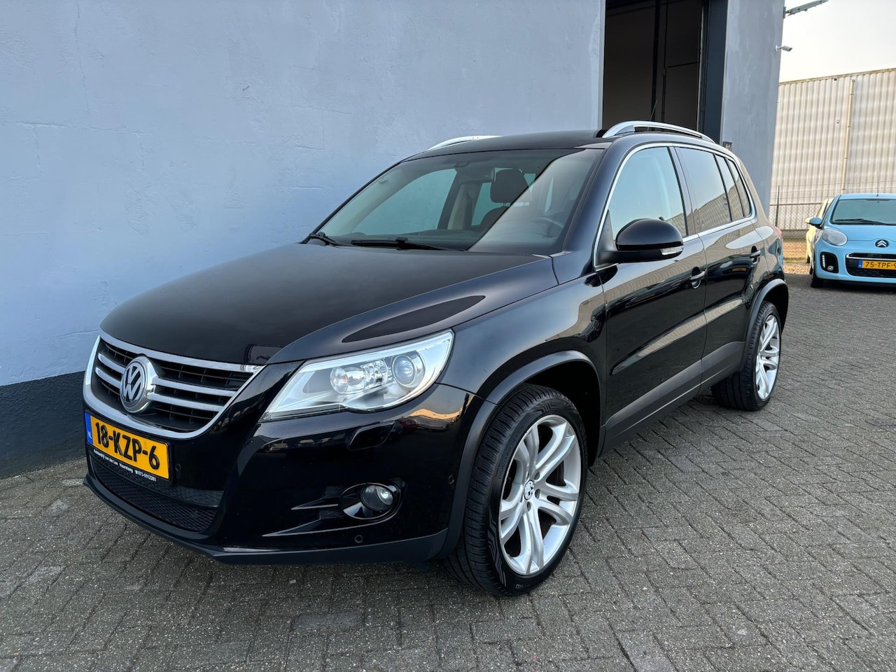 Volkswagen Tiguan - 2.0 TSI Sport&Style 4Motion - AutoWereld.nl