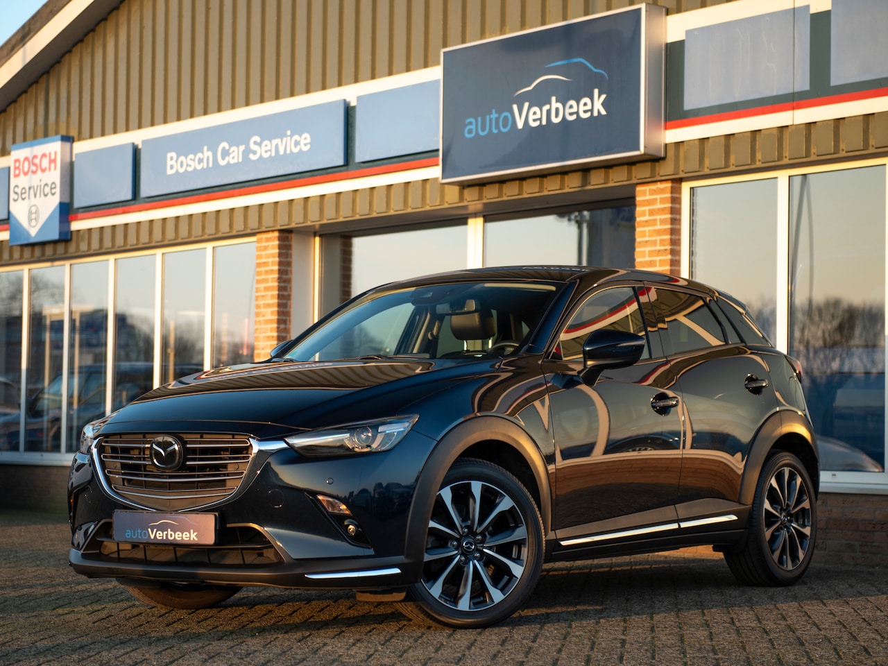 Mazda CX-3 - 2.0 SkyActiv-G 120 GT-M | ACC | Navi | Leder | HuD | Lane Assist | Stoel- & Stuurverwarmin - AutoWereld.nl