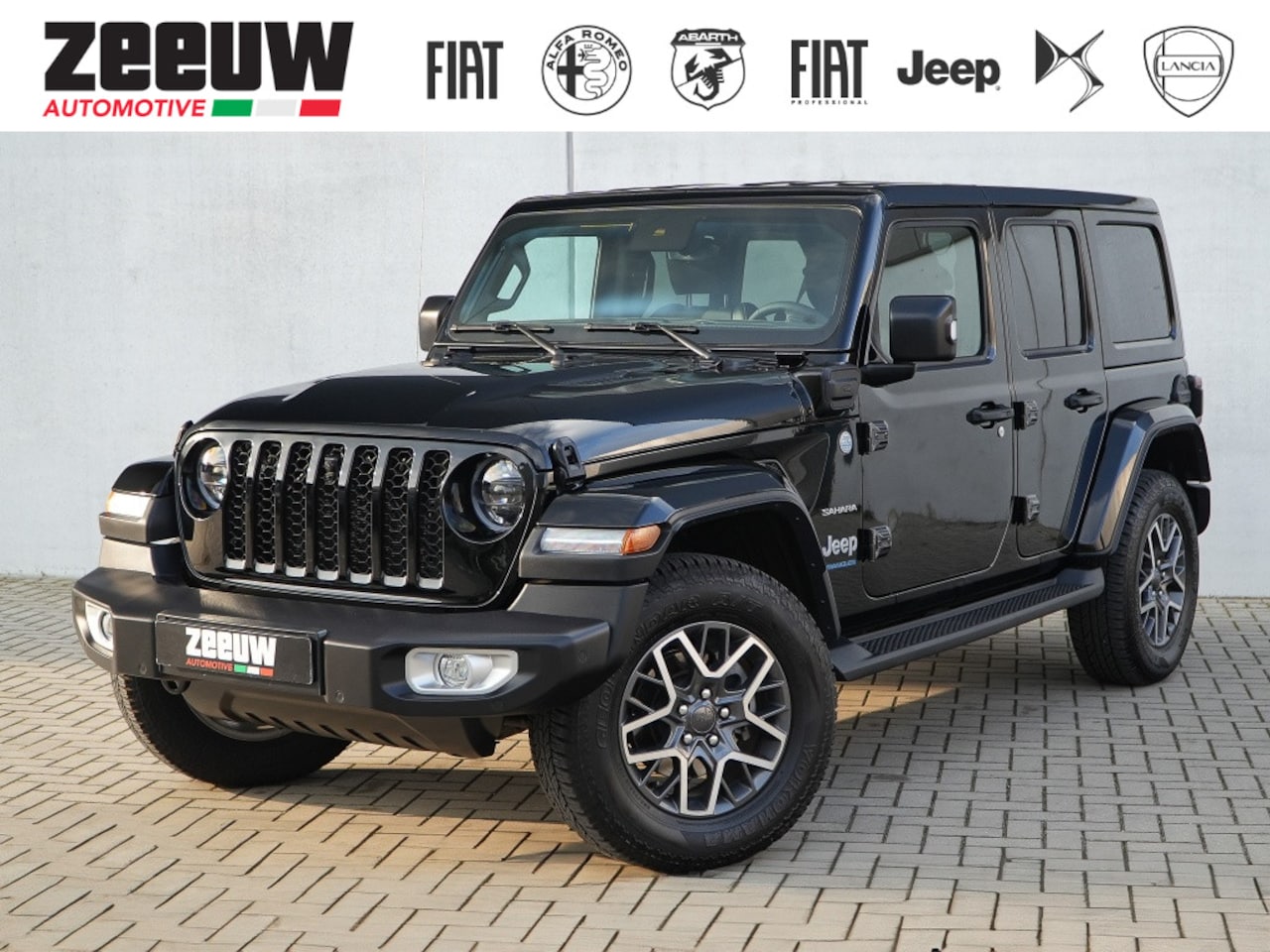 Jeep Wrangler Unlimited - 4xe 380 PK Sahara | Leder | Camera | Navi | 18" - AutoWereld.nl