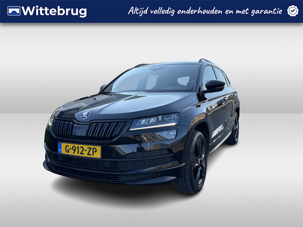 Skoda Karoq - 1.5 TSI ACT Sportline Business NAVI / 18"LMV / CAMERA / Elektr. Achterklep / APP.Connect - AutoWereld.nl