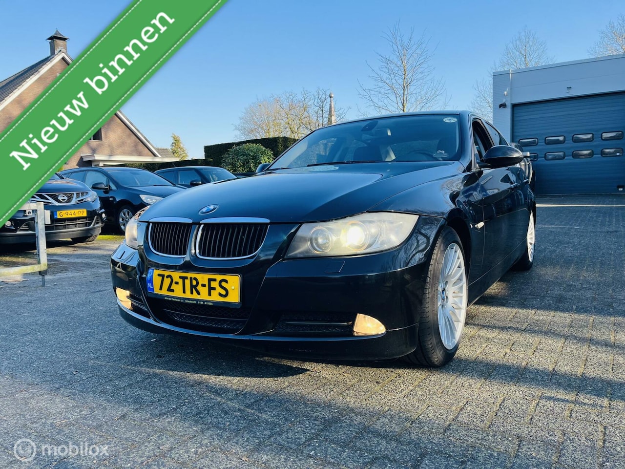 BMW 3-serie - 318i Business Line Sport Clima / Xenon / Audio / PDC - AutoWereld.nl