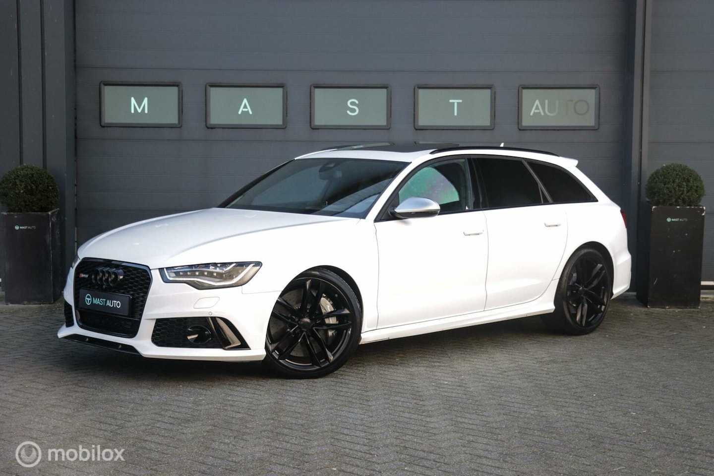 Audi RS6 - Avant 4.0|Keramisch|HUD|ACC|Akrapovic|Pano|Bose| - AutoWereld.nl