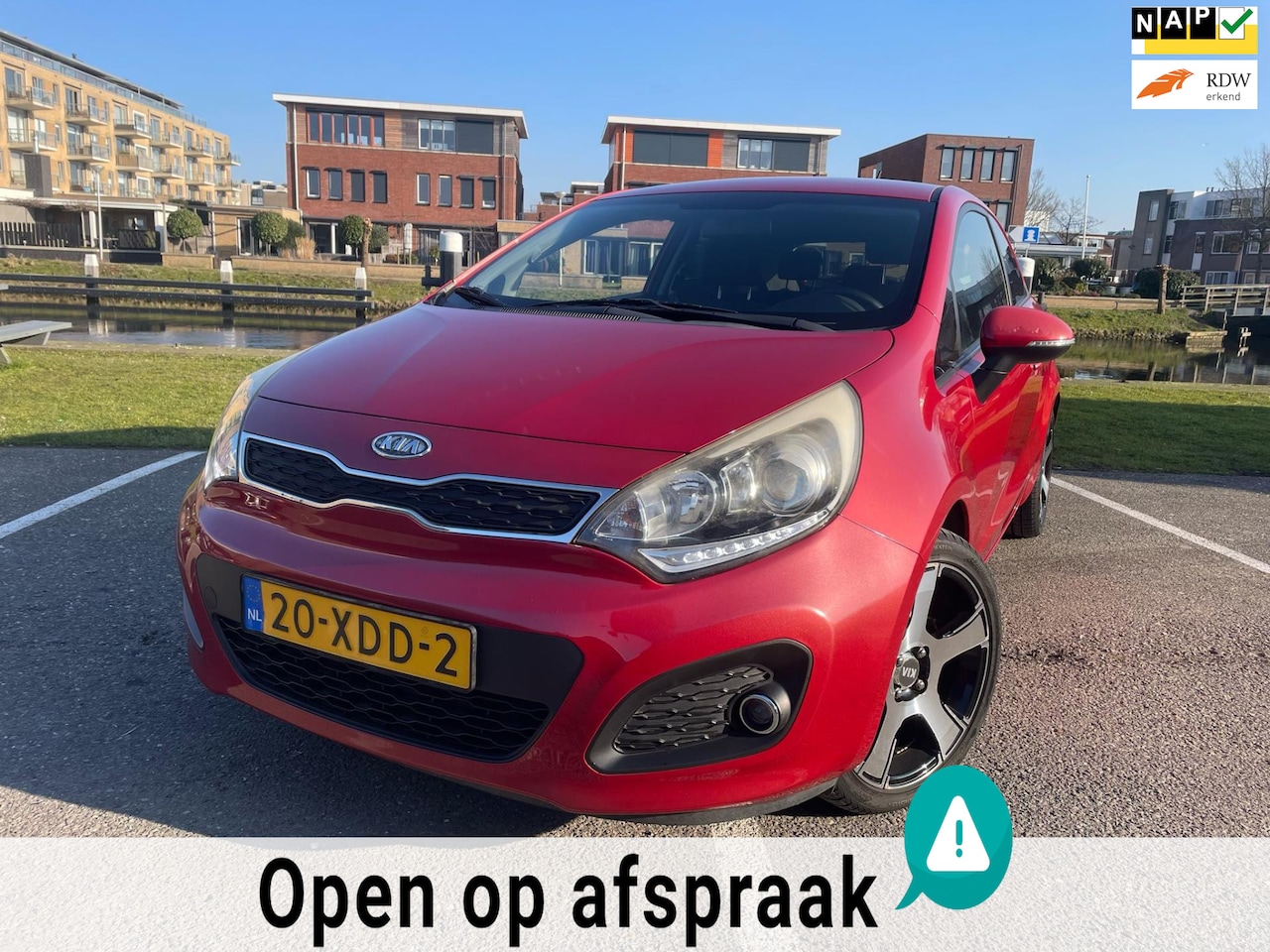 Kia Rio - 1.2 CVVT Super Pack 3DRS NAVI CLIMA PDC LMV LAGE KM - AutoWereld.nl