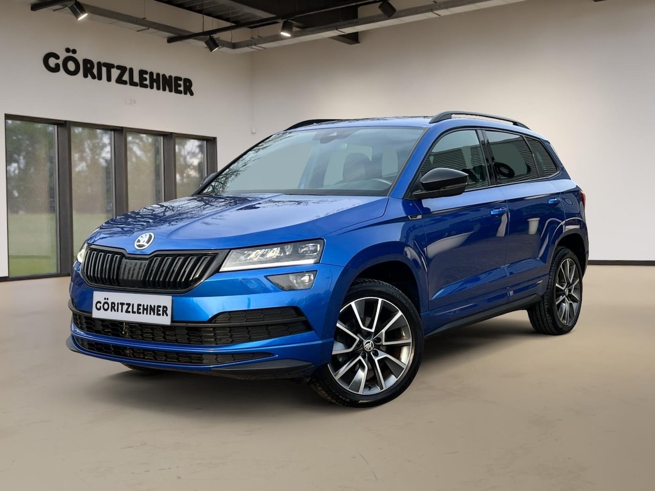 Skoda Karoq - 1.5 TSI DSG Sportline | Leder | Canton Sound | LED verlichting | - AutoWereld.nl