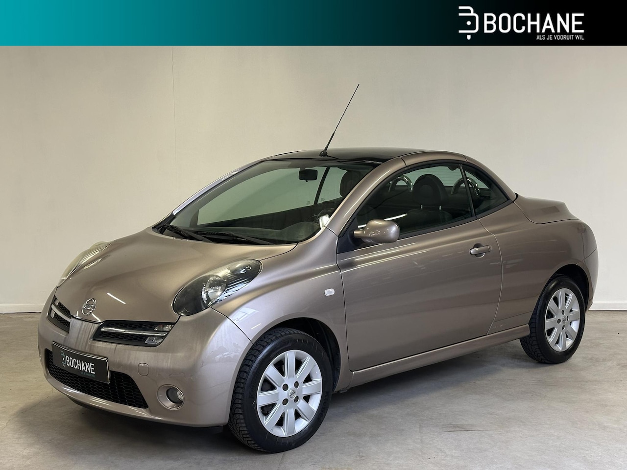 Nissan Micra - 1.6 Tekna | Karmann Cabriolet | Leer | Stoelverwarming | Automatische Airconditioning | - AutoWereld.nl