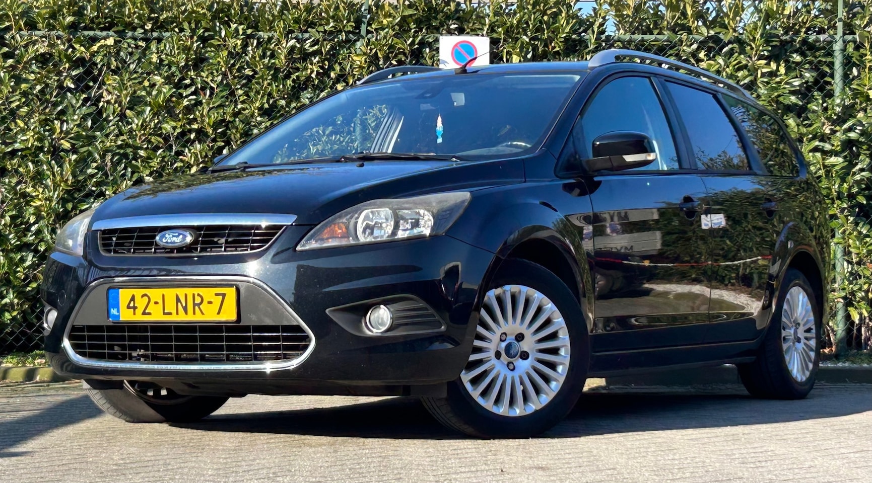 Ford Focus Wagon - 1.8 Limited Flexi Fuel|NAP|Cruise|Navi|Airco|Trekhaak - AutoWereld.nl