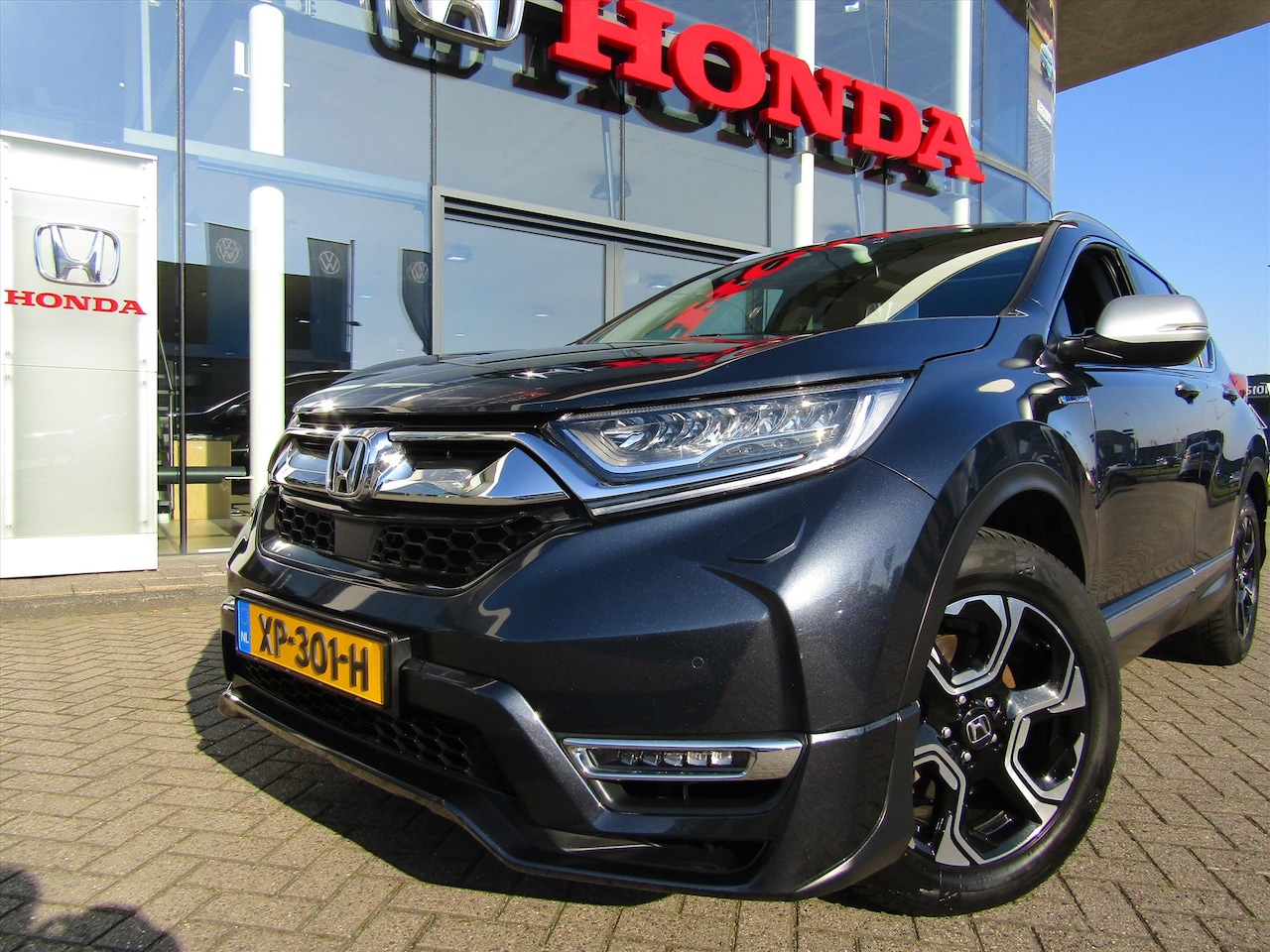 Honda CR-V - 2.0 HYBRID 184pk AWD E-CVT Executive, Allweatherbanden, Trekhaak wegklapbaar, Aero pakket - AutoWereld.nl