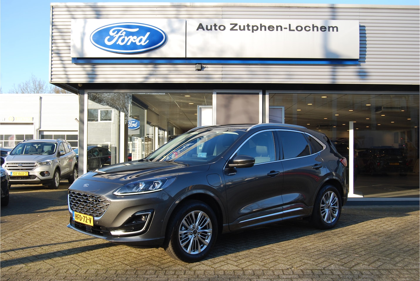 Ford Kuga - 2.5 PHEV Vignale 225PK ELEKTR TREKHAAK | ADAPTIEF CRUISE | WINTERPACK | CAMERA'S | BLIS | - AutoWereld.nl