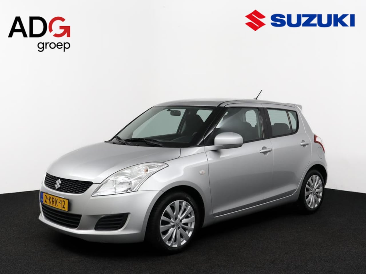 Suzuki Swift - 1.2 Bandit EASSS | Airco | Cruise control | Radio-CD Speler | Stoelverwarming | - AutoWereld.nl