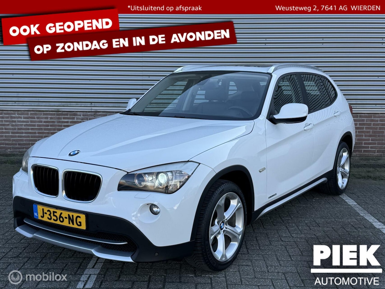 BMW X1 - sDrive18i Executive PANORAMADAK, TREKHAAK - AutoWereld.nl