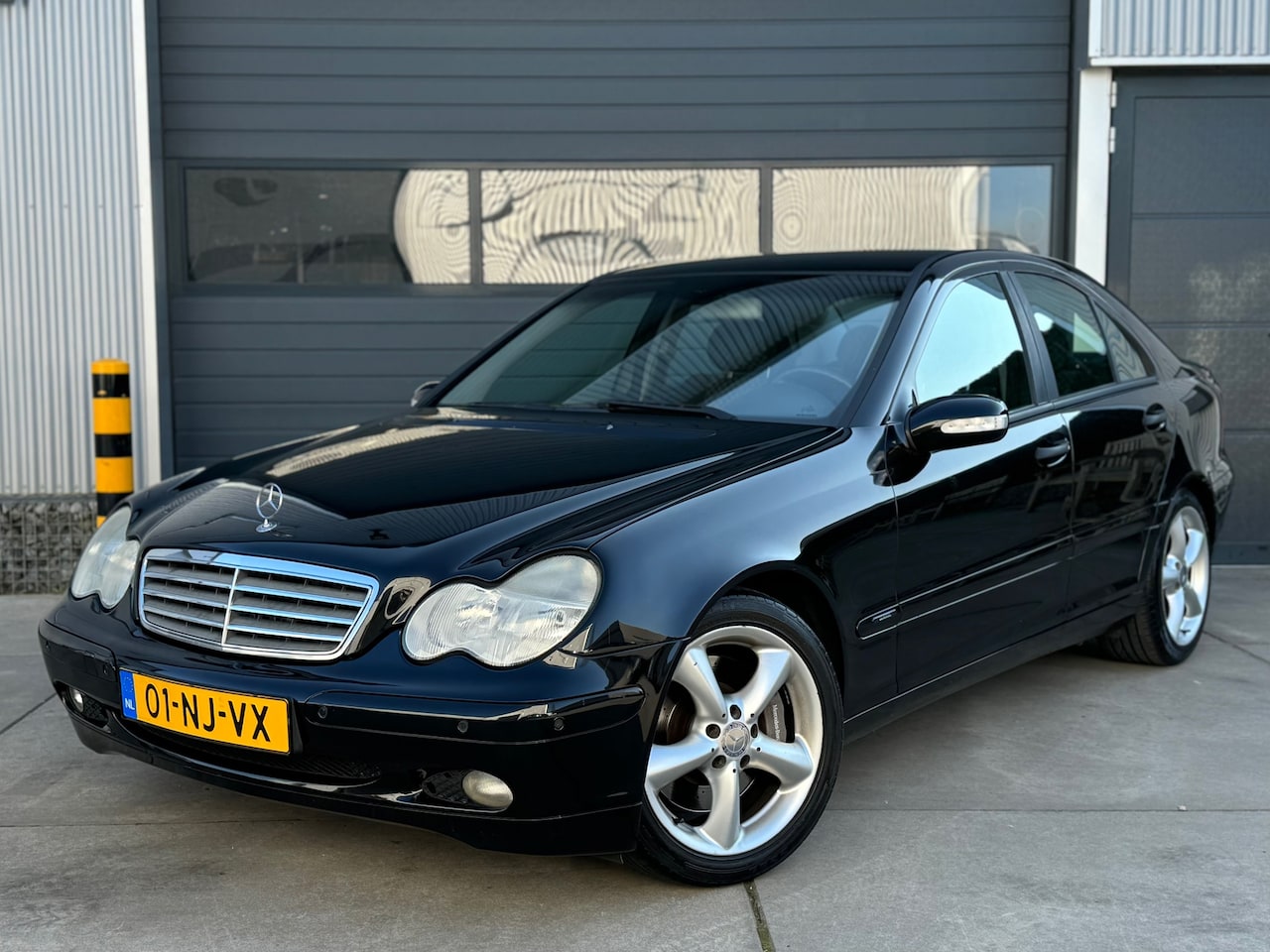 Mercedes-Benz C-klasse - 180 C180 Kompr. AUT / CLIMA / CRUISE / PDC - AutoWereld.nl