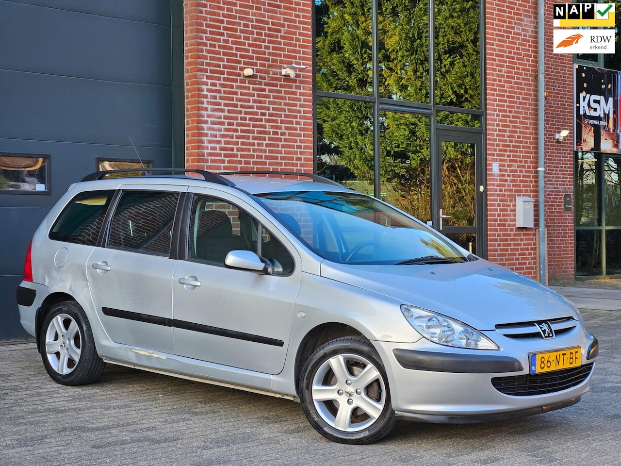 Peugeot 307 Break - 2.0-16V XS Airco|Cruise|Trekhaak|Lmv|Nap|Boekjes - AutoWereld.nl