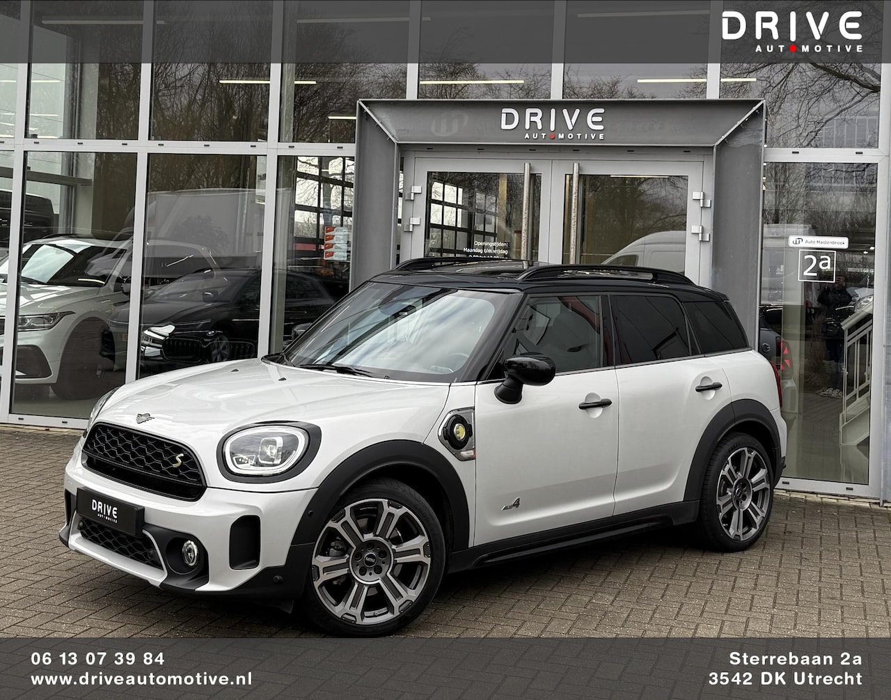 MINI Countryman - Mini 2.0 Cooper S E ALL4 Chili |Pano|Leer|19"|El.Klep|Black-Optic - AutoWereld.nl