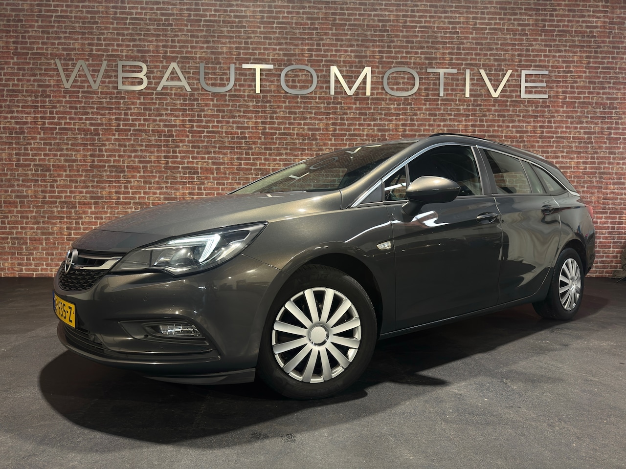 Opel Astra Sports Tourer - 1.0 Business+ Cruise Clima PDC - AutoWereld.nl