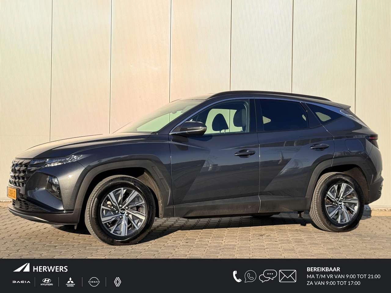 Hyundai Tucson - 1.6 T-GDI HEV Comfort Smart / Trekhaak / Navigatie + Apple Carplay/Android Auto / Climate - AutoWereld.nl