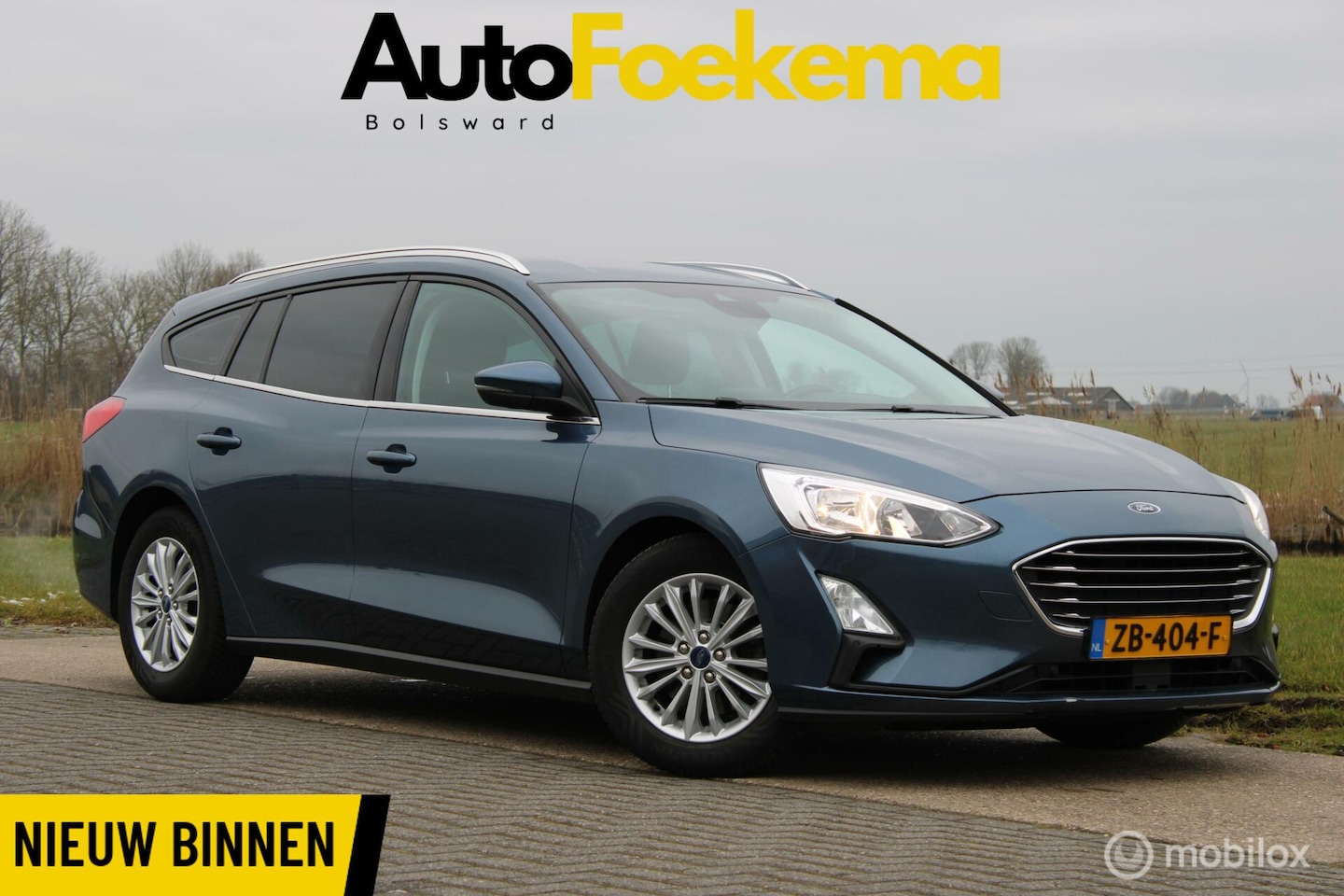 Ford Focus Wagon - 1.0 EcoBoost Titanium Business KEYLESS LED NAVI - AutoWereld.nl