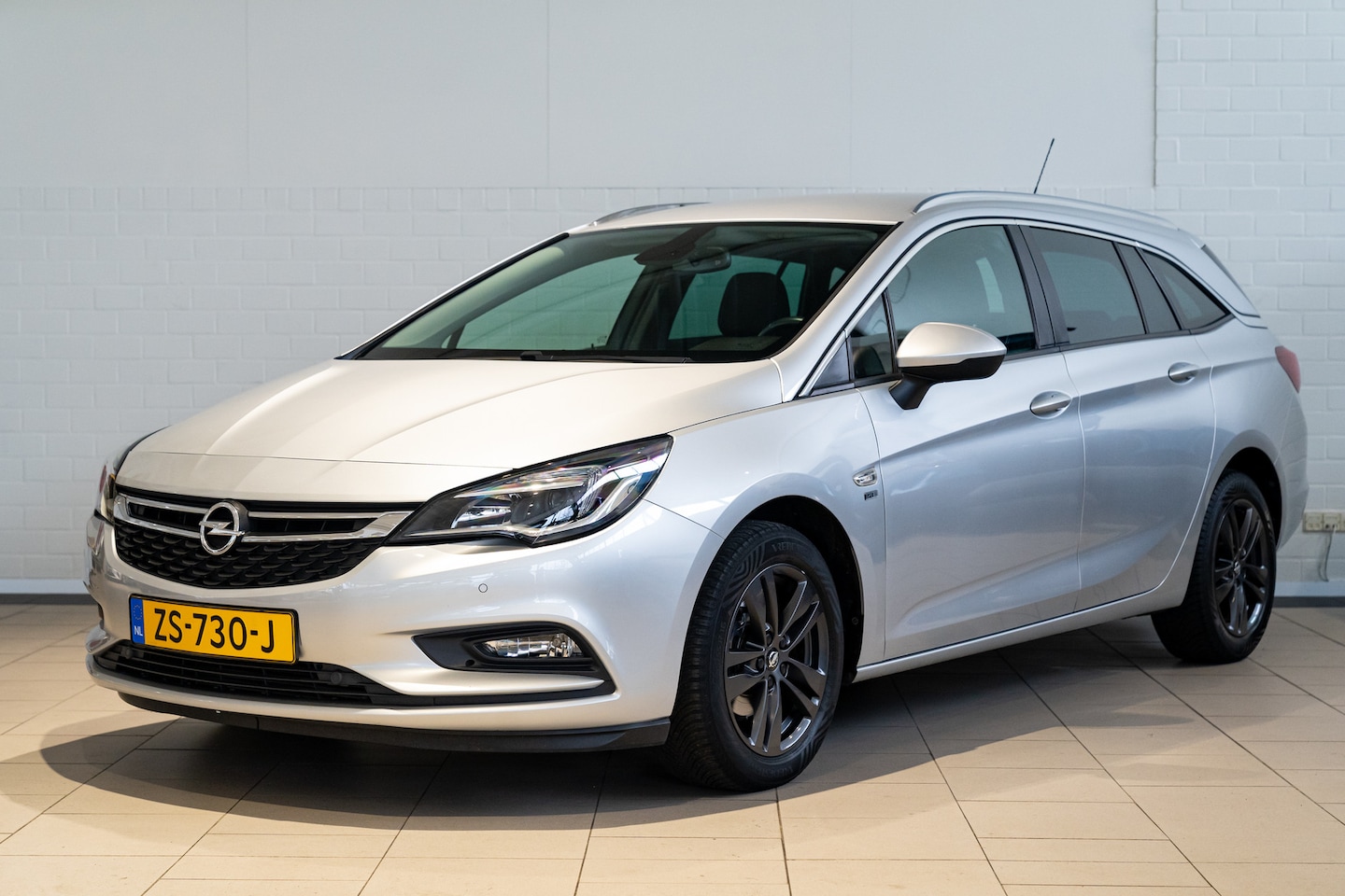 Opel Astra Sports Tourer - 1.0 Turbo 120 Jaar Edition | Climate Controle | Navigatie | Parkeersensoren | Apple Carpla - AutoWereld.nl