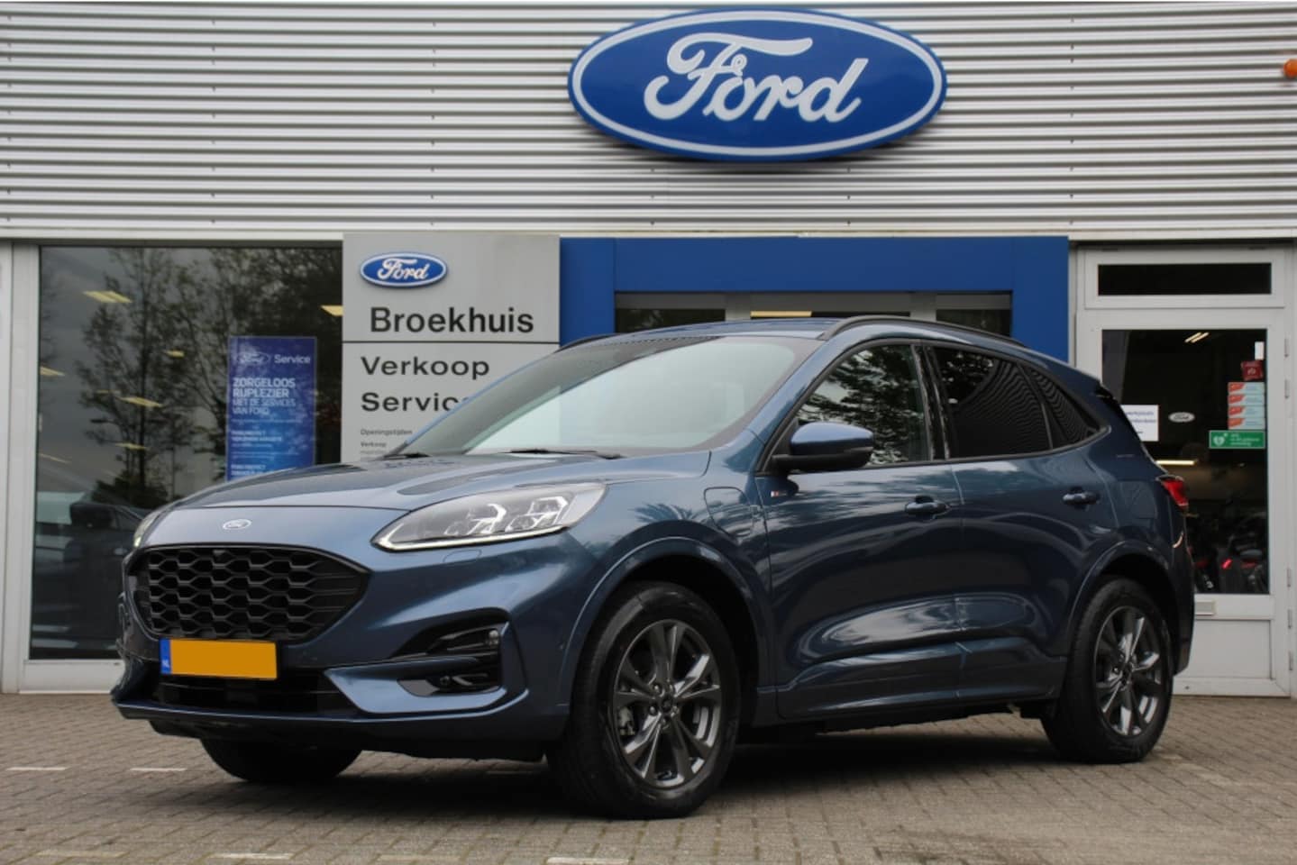 Ford Kuga - 2.5 PHEV ST-LINE | NL-AUTO! | CAMERA | STANDVERWARMING | NAVI | CLIMA | CRUISE | PARKEERSE - AutoWereld.nl