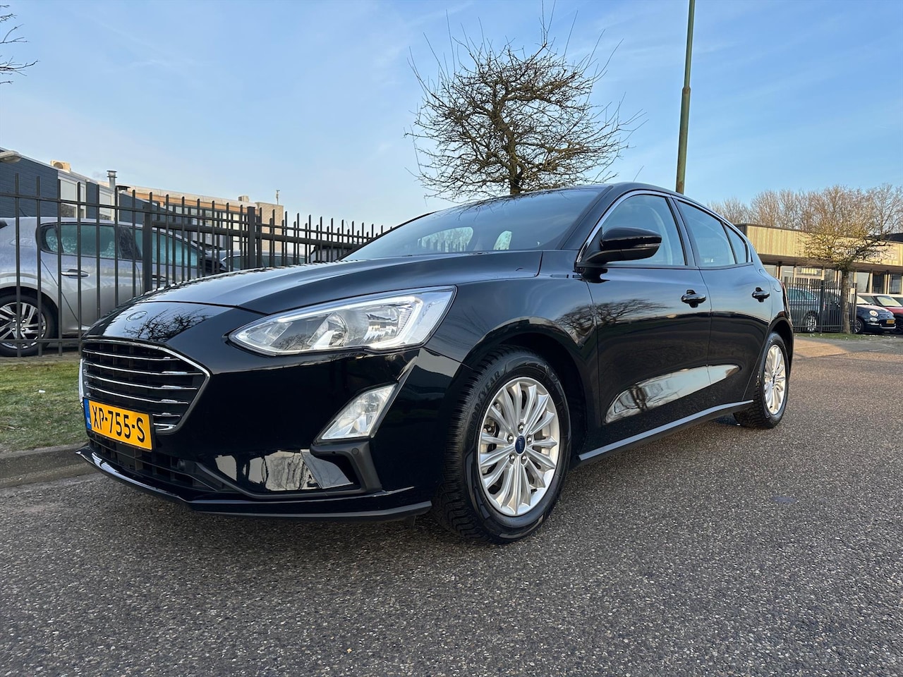 Ford Focus - 1.0 EcoBoost 125pk Titanium Business Navigatie Multi Media - AutoWereld.nl