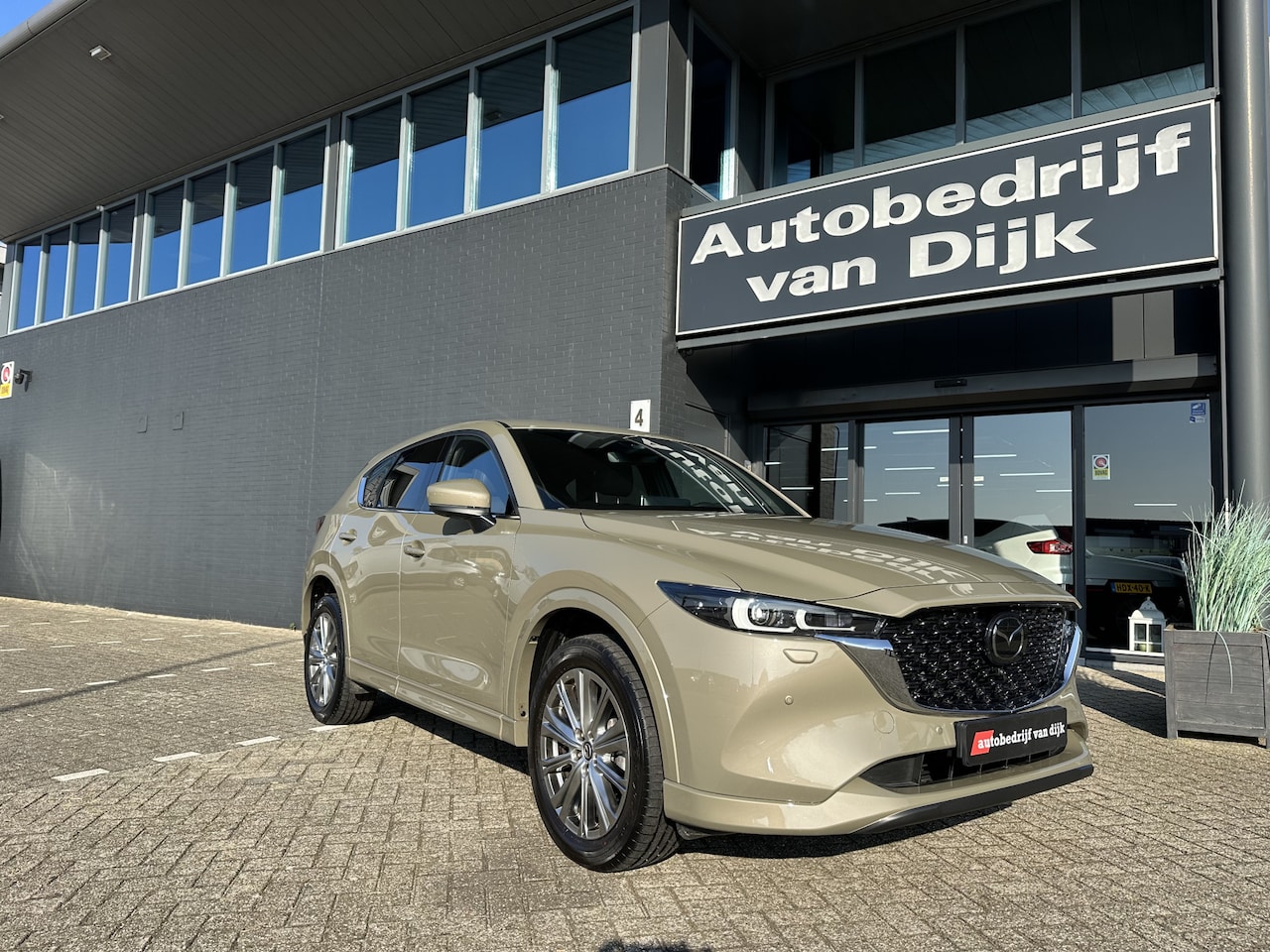 Mazda CX-5 - 2.0 M Hybrid Open Dak Leer Bose Navi 360Camera - AutoWereld.nl