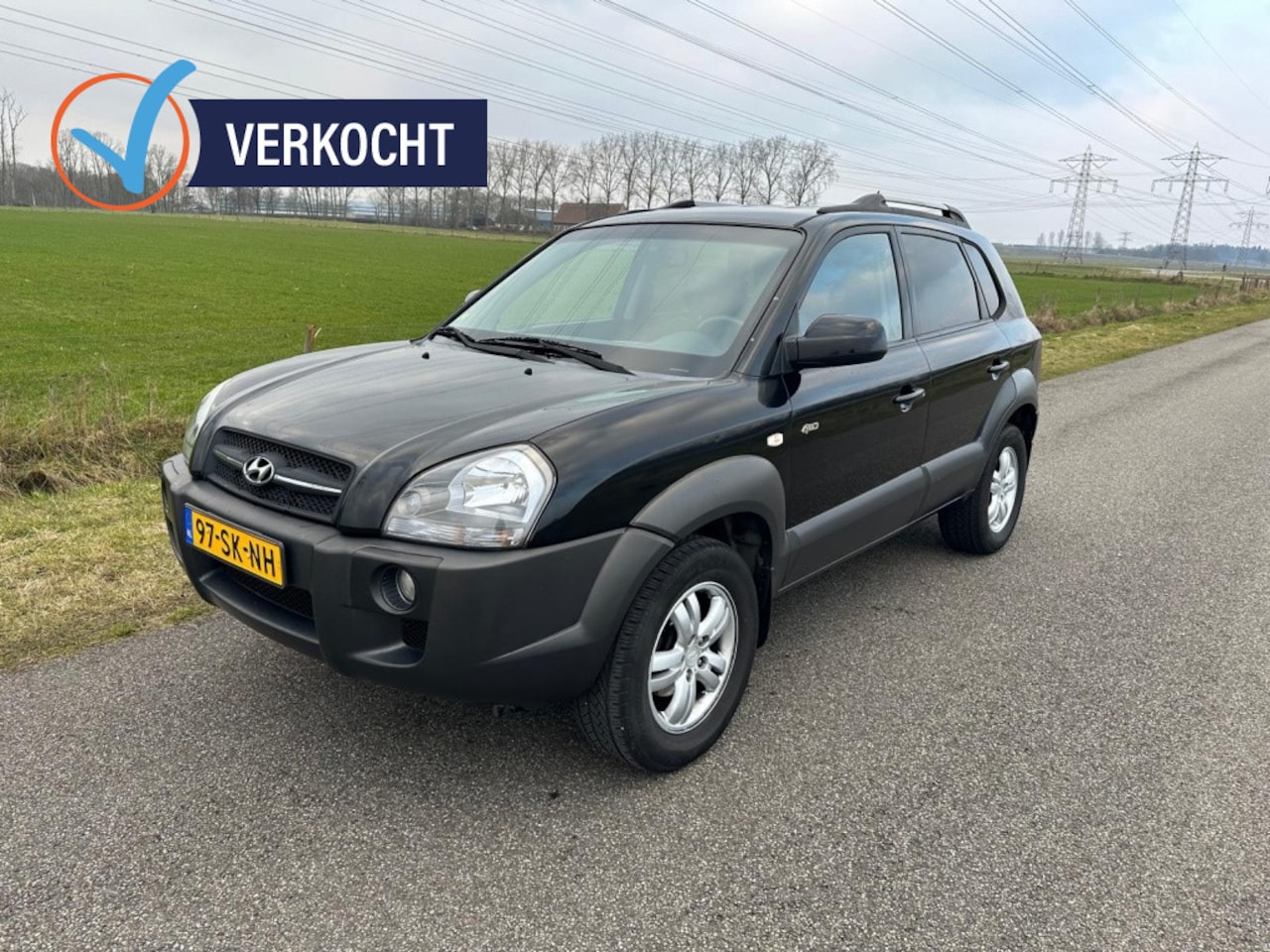 Hyundai Tucson - 2.7i V6 4WD Style DEALER ONDERHOUDEN ! - AutoWereld.nl