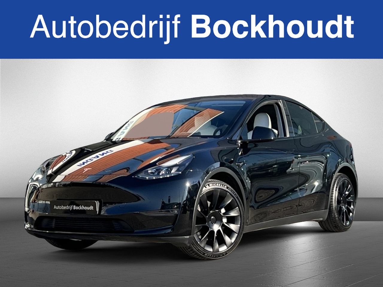 Tesla Model Y - Long Range AWD 75kWh | Pano | Navi | Camera | Trekhaak - AutoWereld.nl